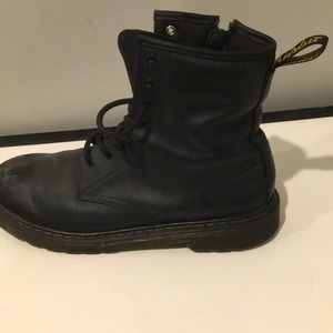 I’m selling these matte black Dr. martens boots.